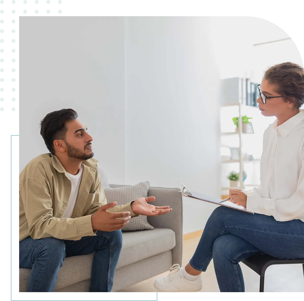 Therapist and client in conversation session.